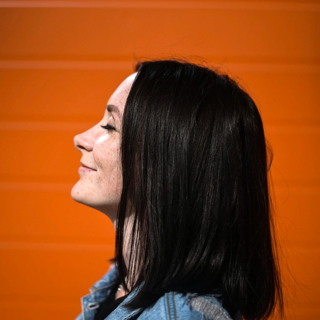 Professional woman PR manager portrait with warm smile